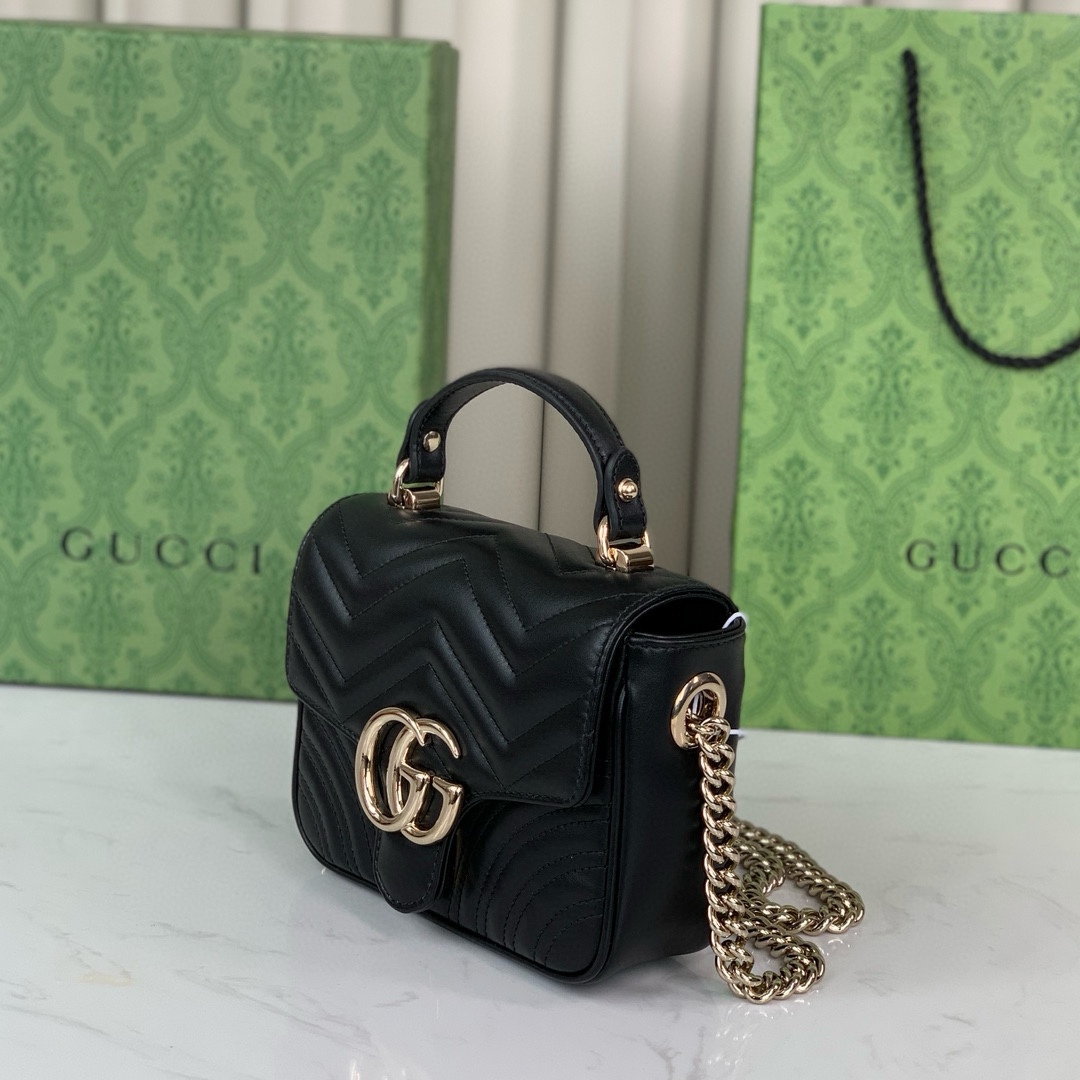 Gucci GG Marmont mini handbag in black quilted V-shaped leather