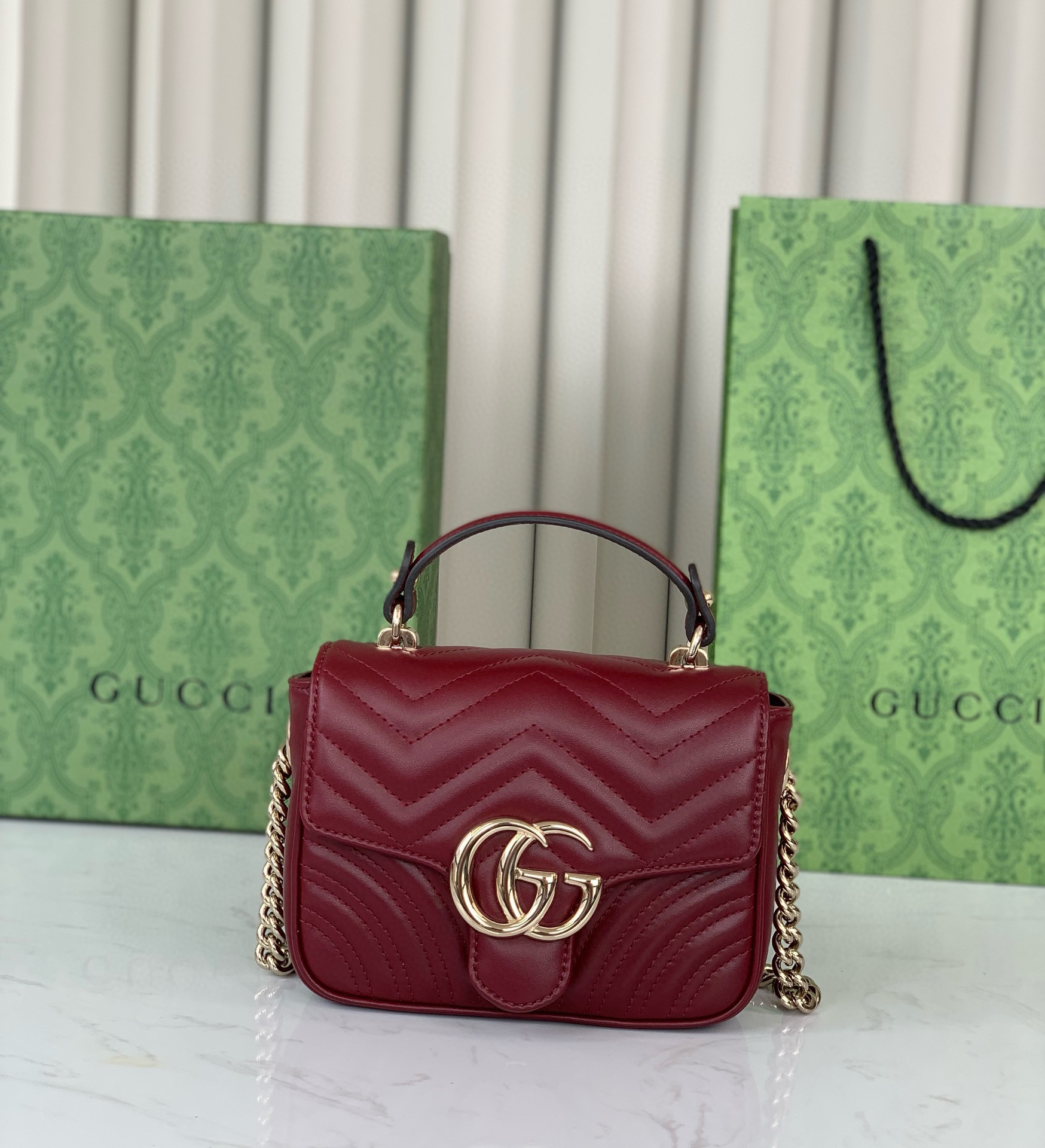 Gucci GG Marmont mini handbag Rosso Ancora V-shaped leather