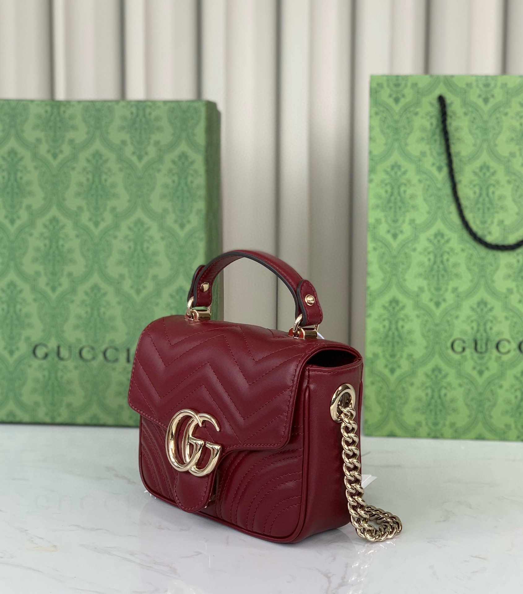 Gucci GG Marmont mini handbag Rosso Ancora V-shaped leather