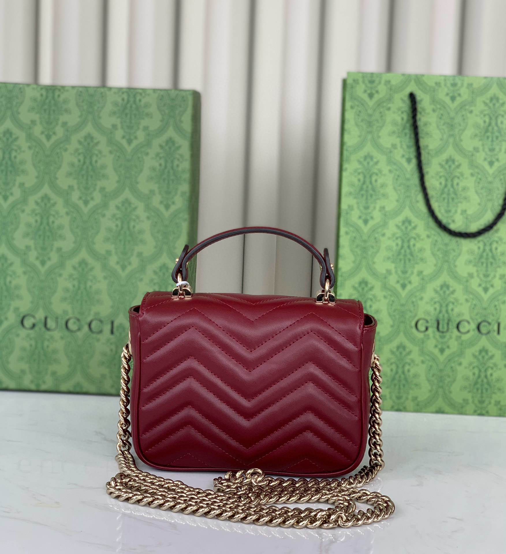 Gucci GG Marmont mini handbag Rosso Ancora V-shaped leather