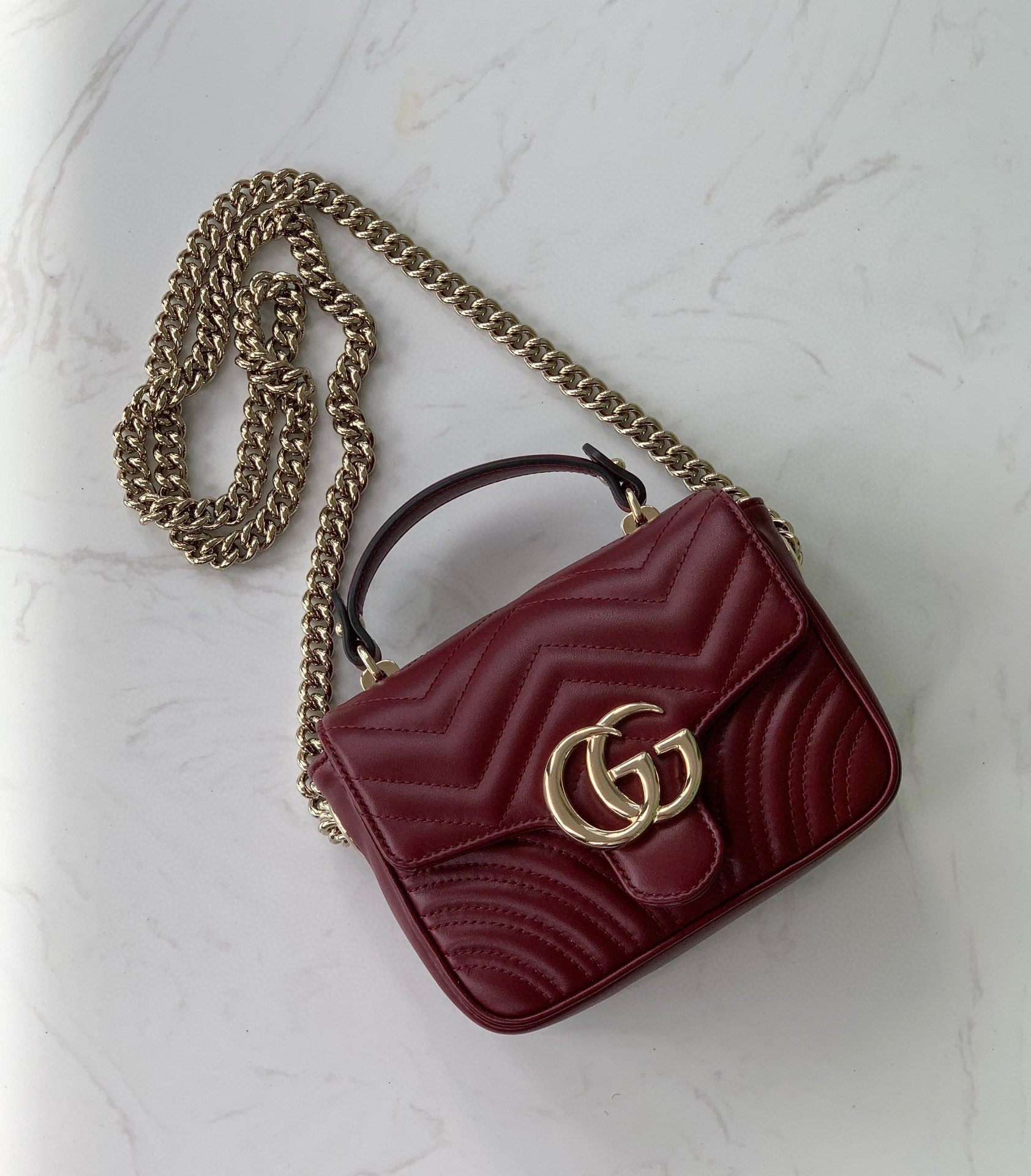 Gucci GG Marmont mini handbag Rosso Ancora V-shaped leather