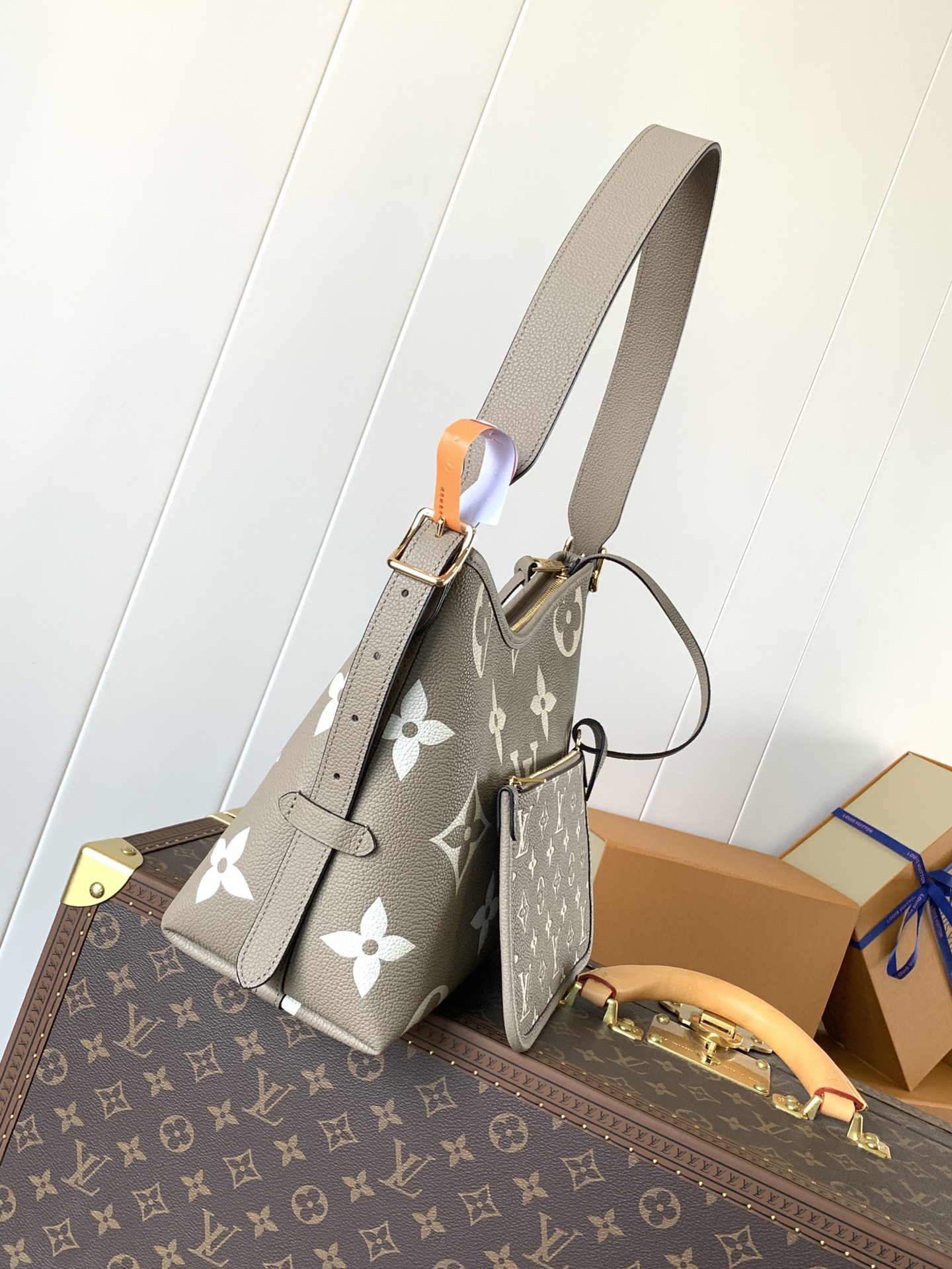 Variable Code Chip LV M47180 ApricotCarryAll small handbag. Monogram Empreinte embossed leather. Detachable zipper bag