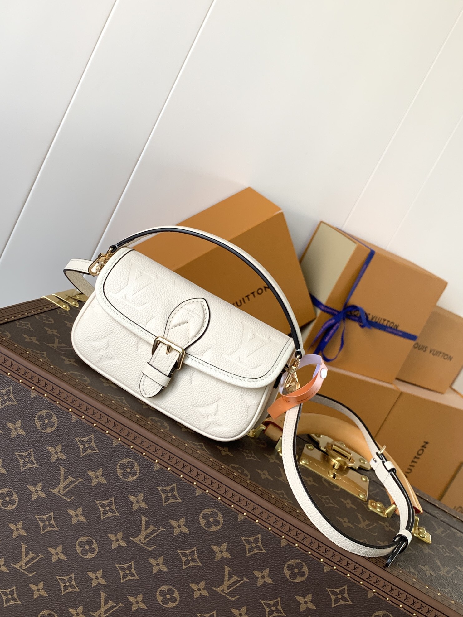 Variable Code Chip LV M83566 m white Nano Diane Handbag. Monogram Empreinte leather. Flap, magnetic buckle open and close