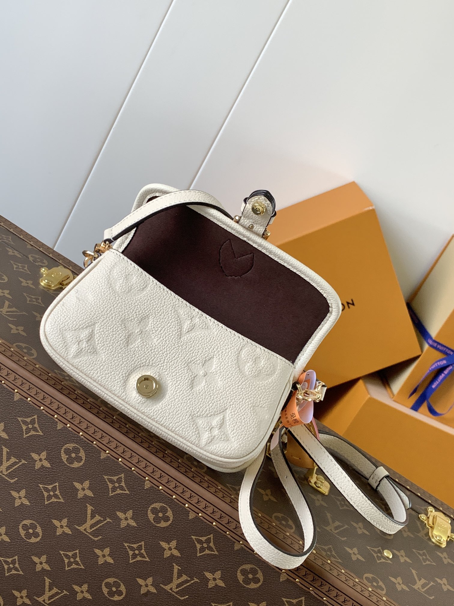 Variable Code Chip LV M83566 m white  Nano Diane Handbag. Monogram Empreinte leather. Flap, magnetic buckle open and close