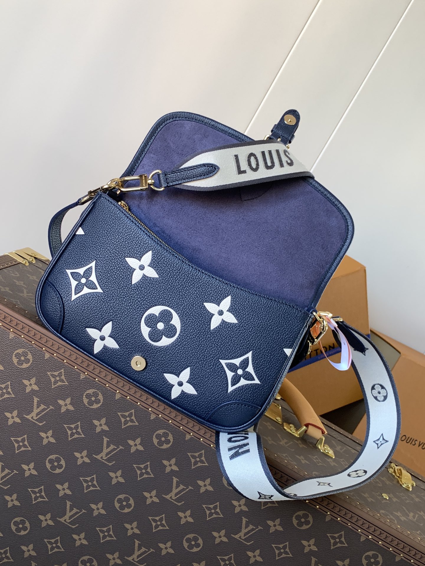 Variable Code Chip LV M47161 Blue  Diane Handbag Monogram Empreinte embossed leather removable wide jacquard shoulder strap