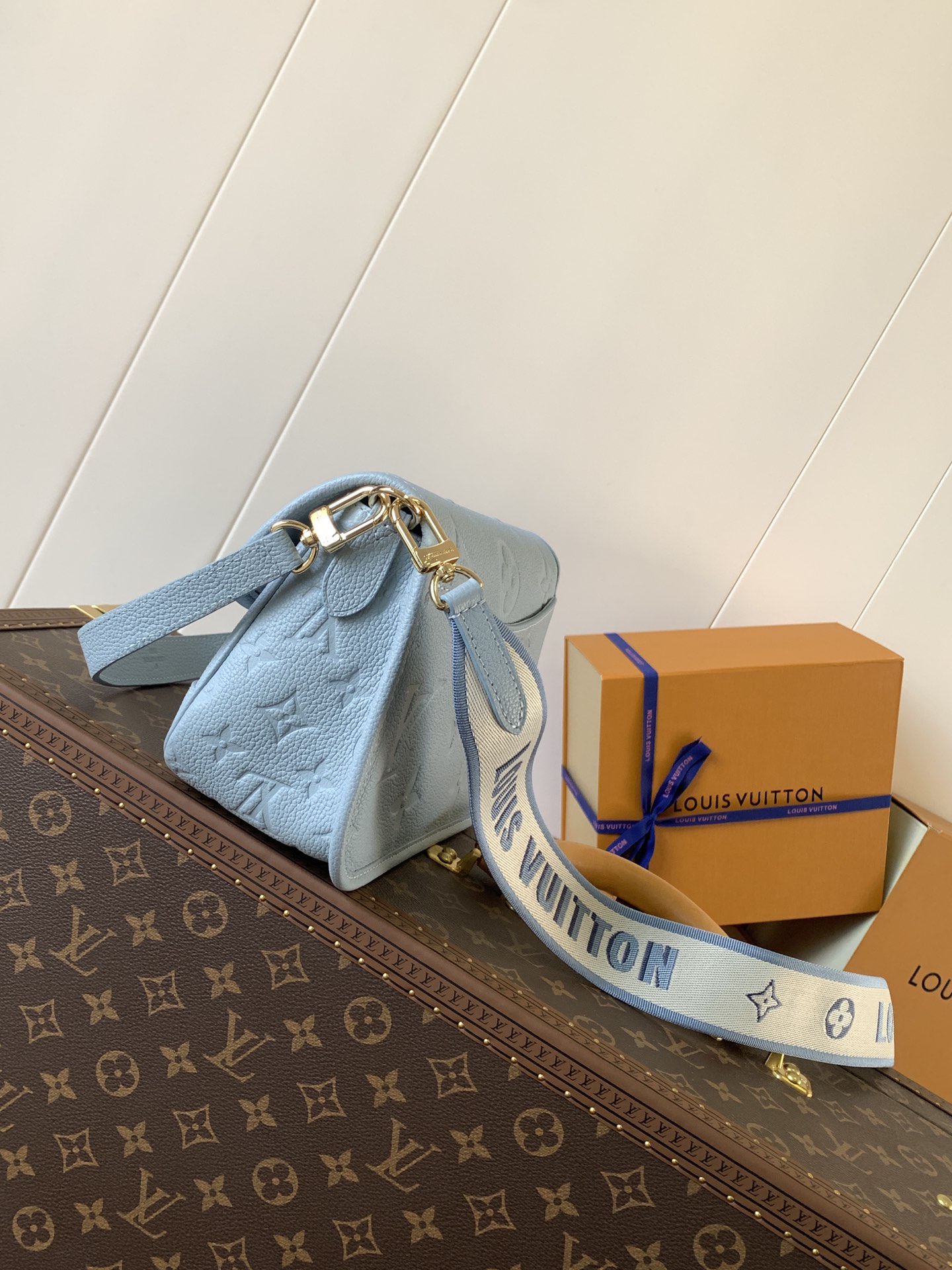 Variable Code Chip LV M46846 Haze blue Diane Handbag Monogram Empreinte embossed leather removable wide jacquard shoulder strap