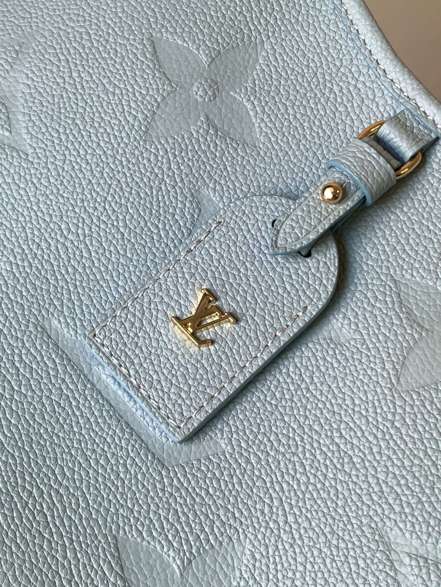 Variable Code Chip LV M47180 Baby blueCarryAll small handbag. Monogram Empreinte embossed leather. Detachable zipper bag