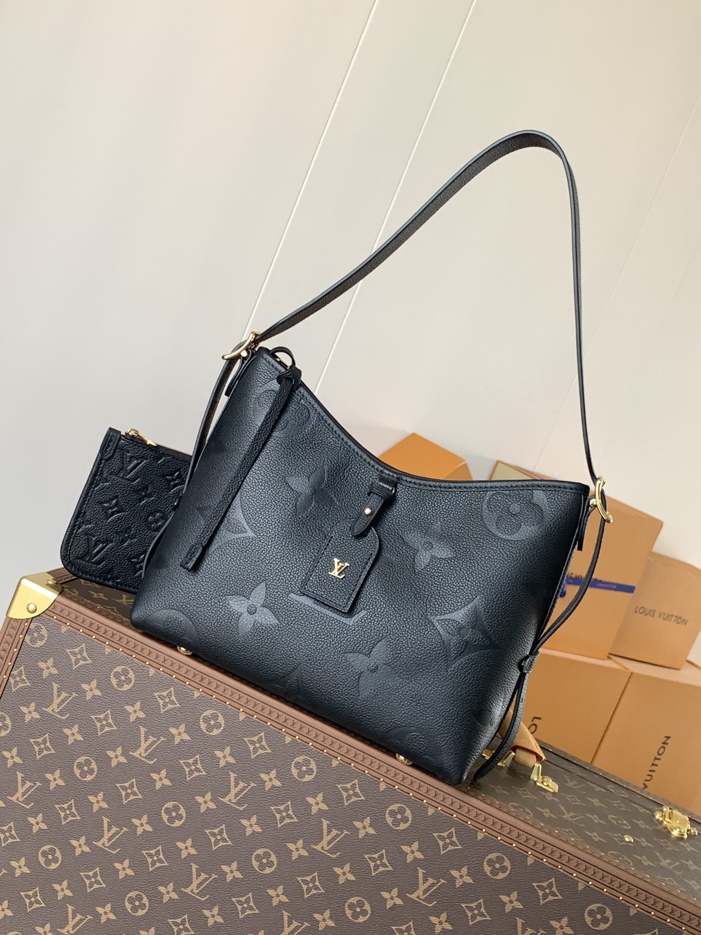 Variable Code Chip LV M46288 BlackCarryAll small handbag. Monogram Empreinte embossed leather. Detachable zipper bag