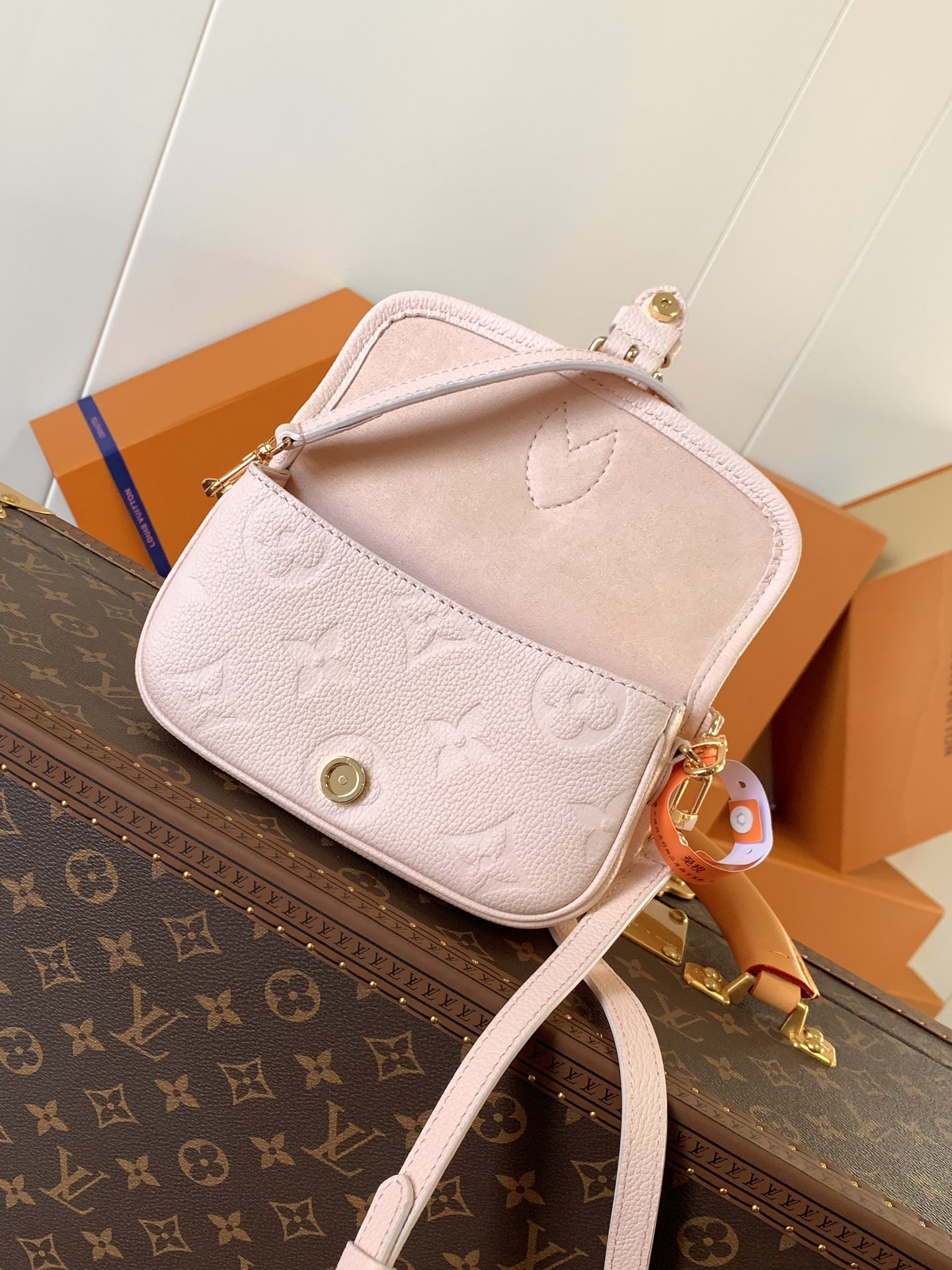 Variable Code Chip LV M83566 PinkNano Diane Handbag. Monogram Empreinte leather. Flap, magnetic buckle open and close