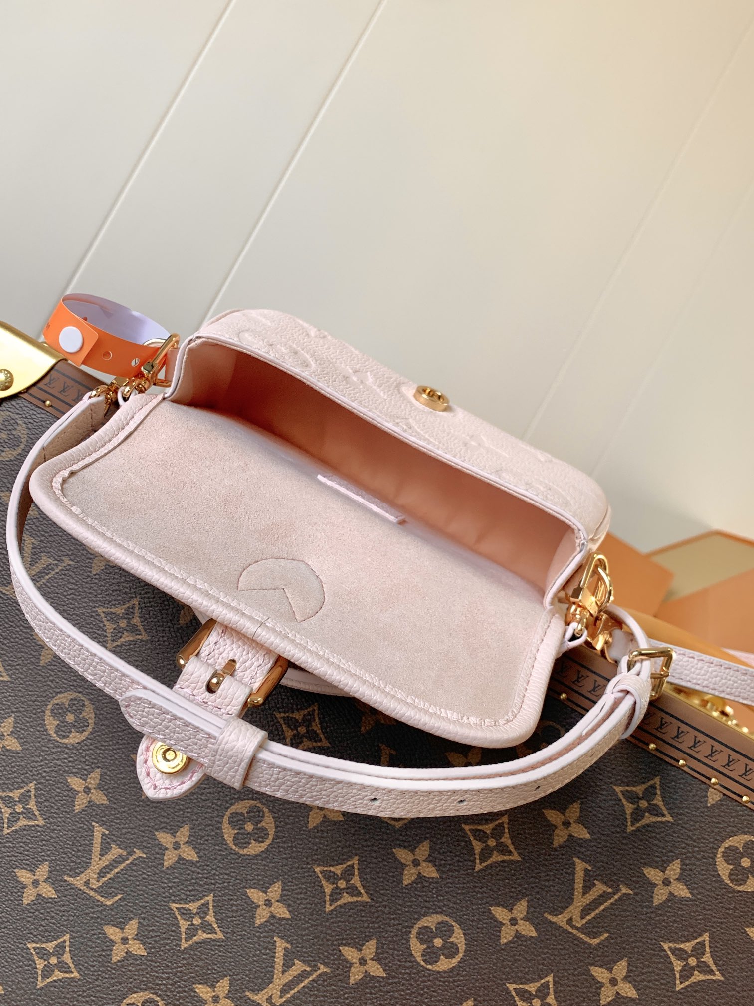 Variable Code Chip LV M83566 PinkNano Diane Handbag. Monogram Empreinte leather. Flap, magnetic buckle open and close