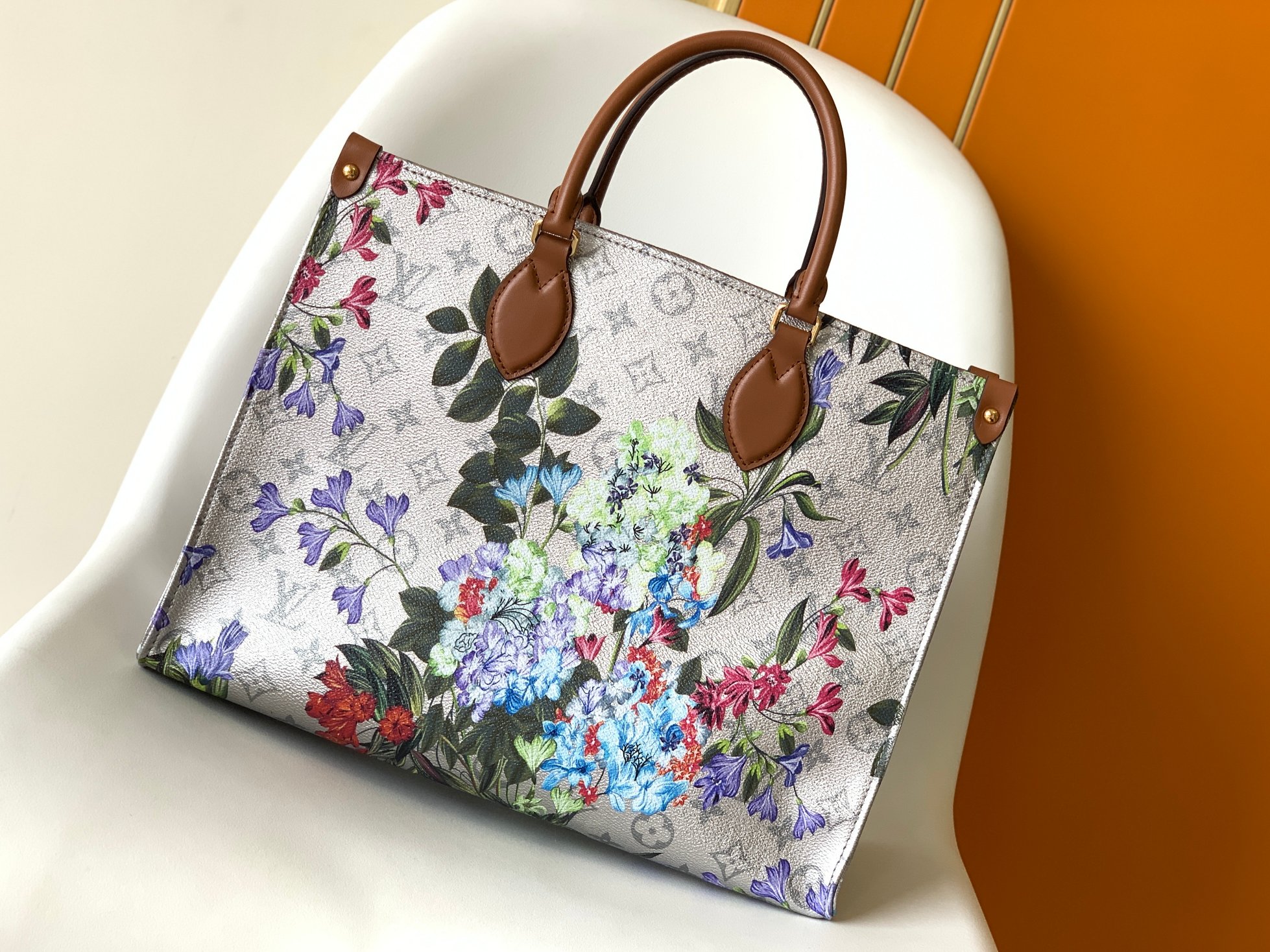 OnTheGo Handbag M21233 by Louis Vuitton LV in White Floral Print Monogram Empreinte Leather