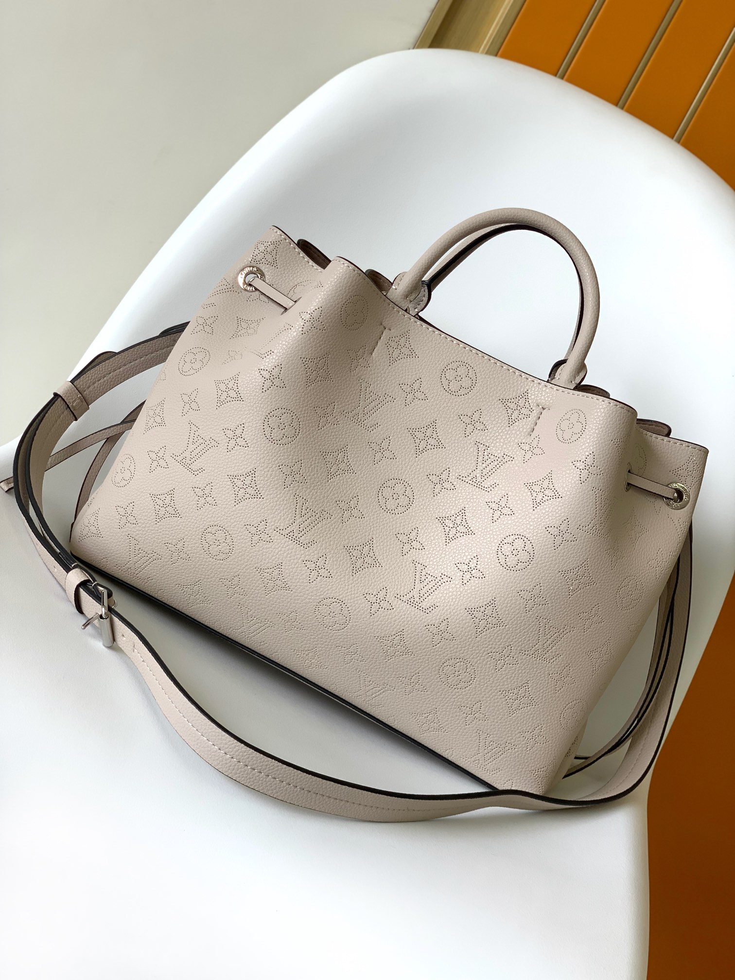 Louis Vuitton LV M59201 Bella Tote Handbag in Grey Perforated Leather