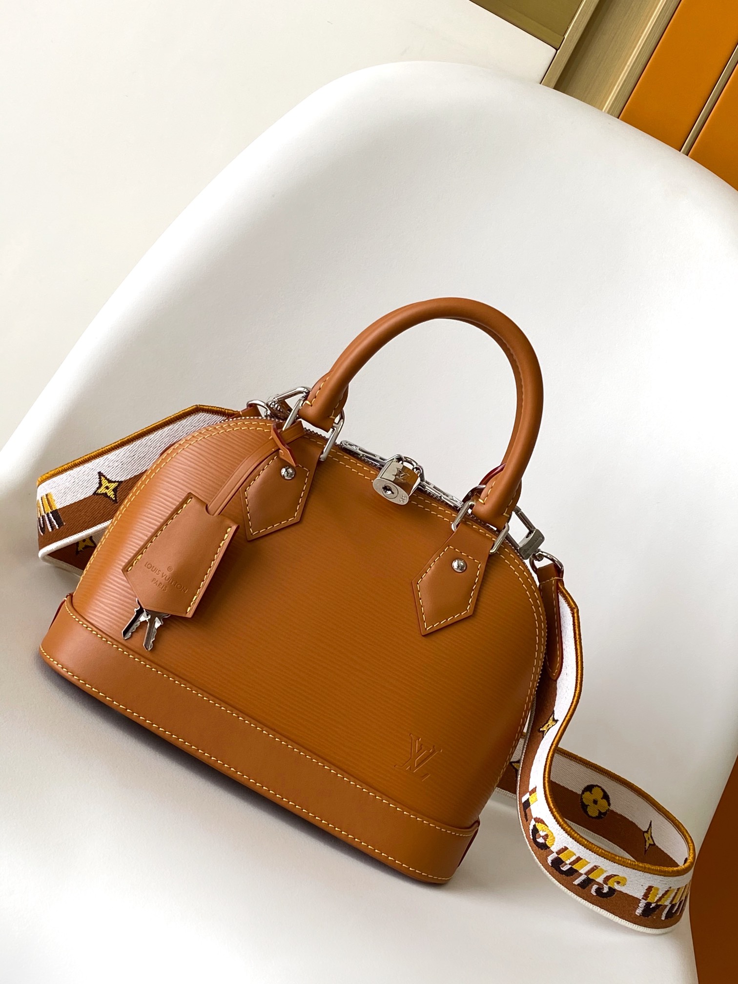 Louis Vuitton LV M57540 Alma BB Handbag in Caramel Epi Leather