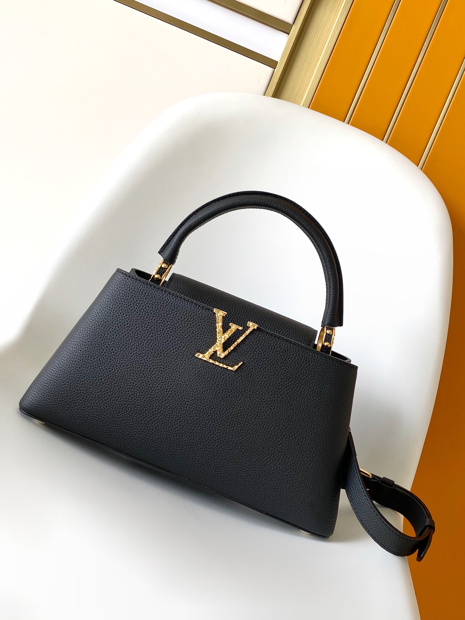 Louis Vuitton LV M24664 Capucines East West Mini Handbag in Black