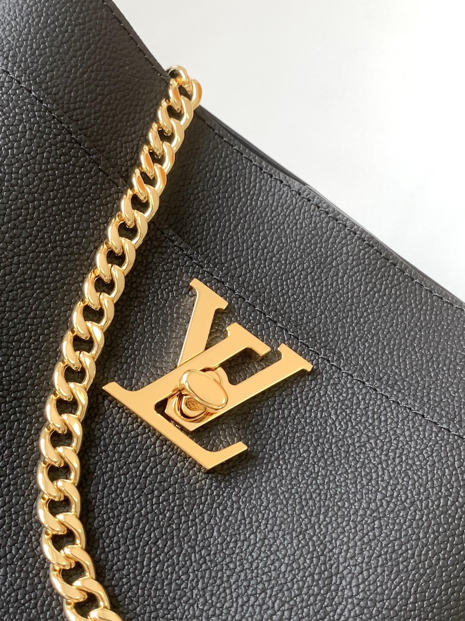 Louis Vuitton LV M24006 Lock and Walk Bucket Bag in Black