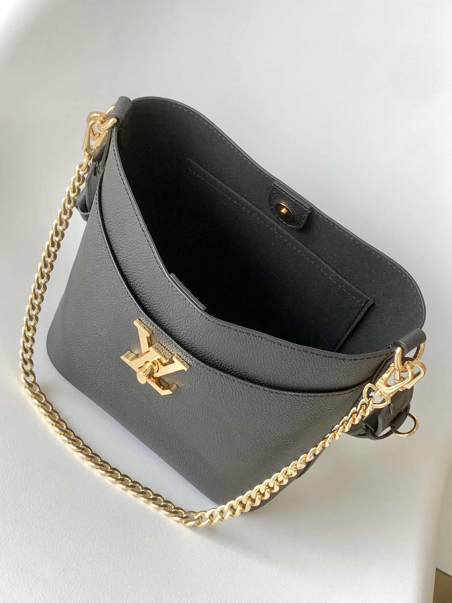 Louis Vuitton LV M24006 Lock and Walk Bucket Bag in Black