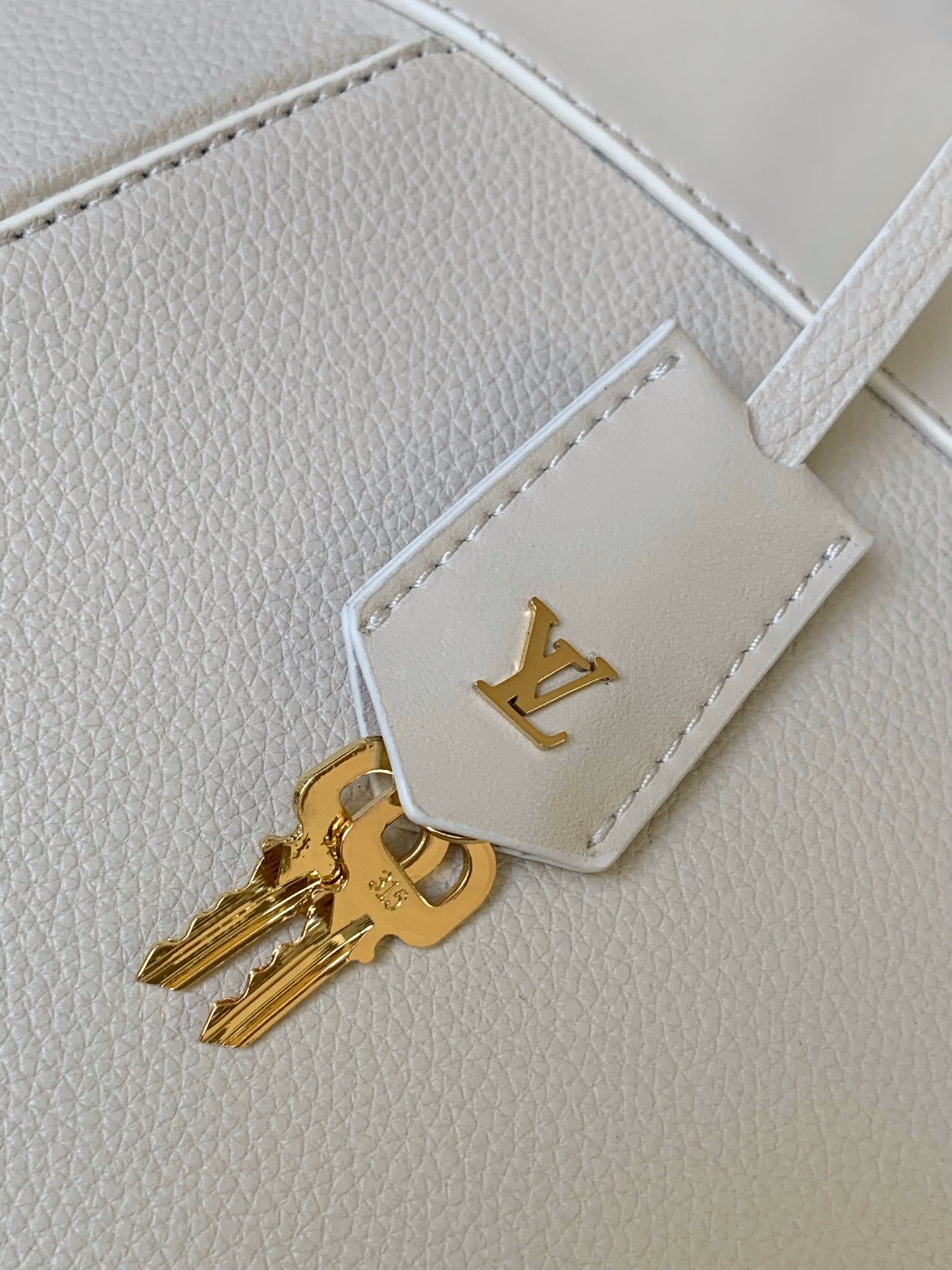 Louis Vuitton LV Lock It MM Bag M23061 Cream