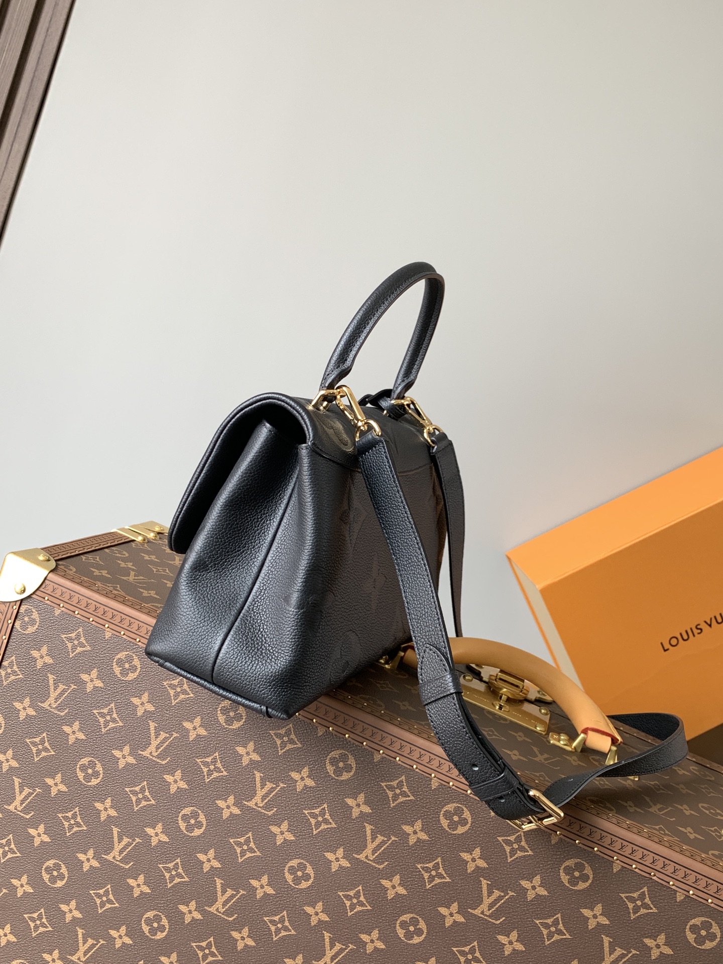 Louis Vuitton LV M45976 Madeleine MM Handbag in Embossed Black