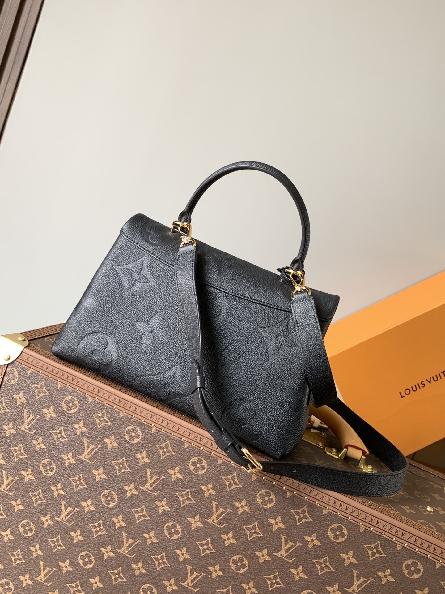 Louis Vuitton LV M45976 Madeleine MM Handbag in Embossed Black